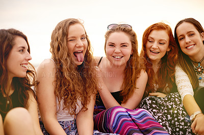 Buy stock photo Girl, portrait and tongue out with friends outdoor, happy group and travel with vacation for bonding. Fun, funny face and excited people with adventure, holiday or weekend break together for reunion