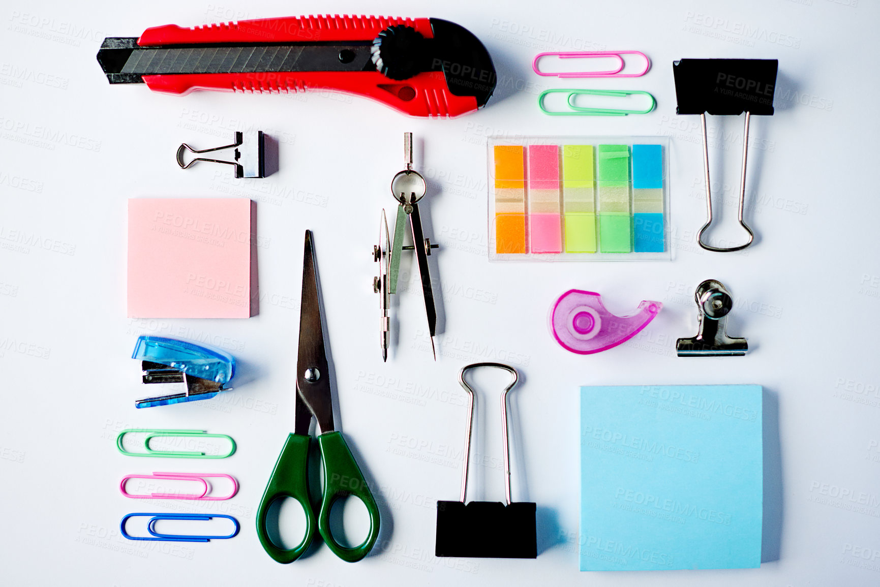 Buy stock photo Business, flat lay and stationery on desk in empty office, ready for creative planning or design. Scissors, sticky notes and utility knife on table of workstation for productivity process from above