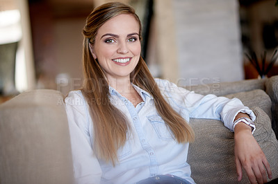 Buy stock photo Portrait, smile and woman in living room for relax, peace and calm on weekend for staycation. House, happy person and chill on sofa for comfort, break or confidence in morning at home in Australia