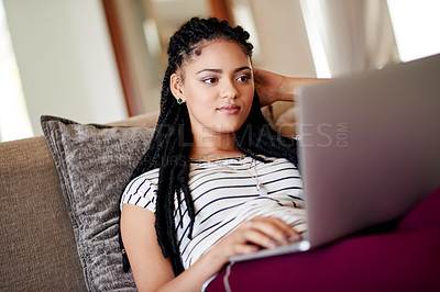Buy stock photo Laptop, reading and woman in living room for social media, relax and browse in home for scholarship. Student, internet and person with university break, website and research for college education