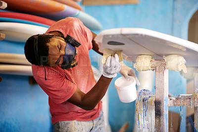 Buy stock photo Surfboard, plastic and man in workshop for building, manufacturing and customization. Craft, small business and person with equipment for repairs, fibreglass maintenance and renovation in garage