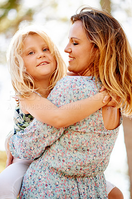 Buy stock photo Mother, smile and hug child in nature for love, care and bonding together for connection on holiday. Mom, carry girl and embrace kid at park for support, trust and happy parent on family vacation