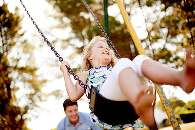 Buy stock photo Happy man, playground and child at park with swing in air, bonding and sunlight for fun childhood memories. Smile, nature and daughter outdoor with father, laugh playing and together for connection.