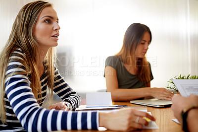 Buy stock photo Woman, team and office meeting at startup for talk, documents or review for planning at media company. People, group and paperwork for project, report or collaboration with insight at creative agency
