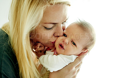 Buy stock photo Baby, mother and kiss for bonding with love, affection and newborn with comfort, moment and care. Peace, calm and relationship growth for family, infant and woman with hug for new motherhood