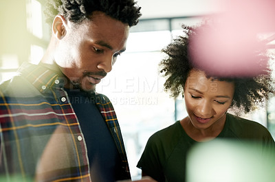 Buy stock photo Man, woman and planning at glass wall, office and insight with notes for brainstorming at media company. Black people, team and partner at startup with board, review or feedback at creative agency