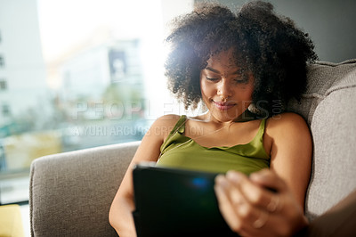 Buy stock photo Relax, tablet and scroll with woman on sofa for social media, streaming service and connection. Movie showtimes, subscription and film schedule with person in living room of home for web search