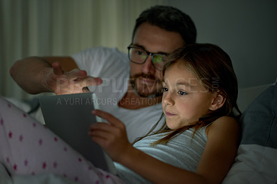 Buy stock photo Night, parent and child in home with tablet for digital app, bedtime storytelling or playing games. Late, father or daughter in bedroom with tech for reading ebook, watching video or bonding together