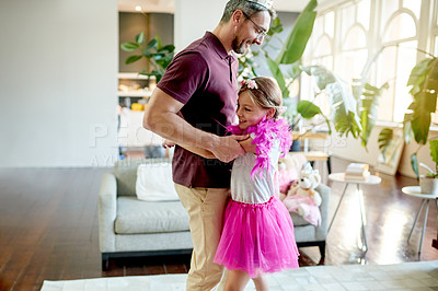 Buy stock photo Home, dancing and father with girl, costume and bonding together with happiness, care and learning. Apartment, family and dad with daughter, smile and parent with child development, fun and love
