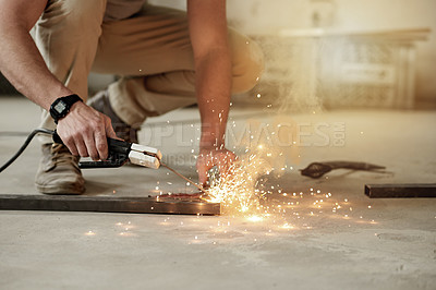 Buy stock photo Hands, sparks and welding with man in workshop for manufacturing or production process. Engineering, industry and metalwork with freelance person in garage for expertise or small business startup