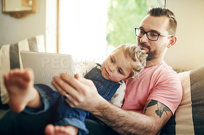 Buy stock photo Lounge, child and dad with tablet, bonding and watching movie with subscription on website and relax. Family, man and streaming cartoons with daughter, online and entertainment with tech in house