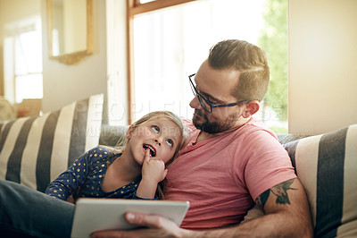 Buy stock photo Happy, man or child on couch with tablet, watching or bonding for special family memory. Smile, father or daughter in living room with technology, mobile app and connection for cartoon shows.