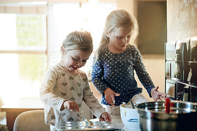 Buy stock photo Baking, development and kitchen with girl children in home together for learning or growth. Cooking, fun and messy with sister kids at counter in apartment for ingredients or recipe as baker family