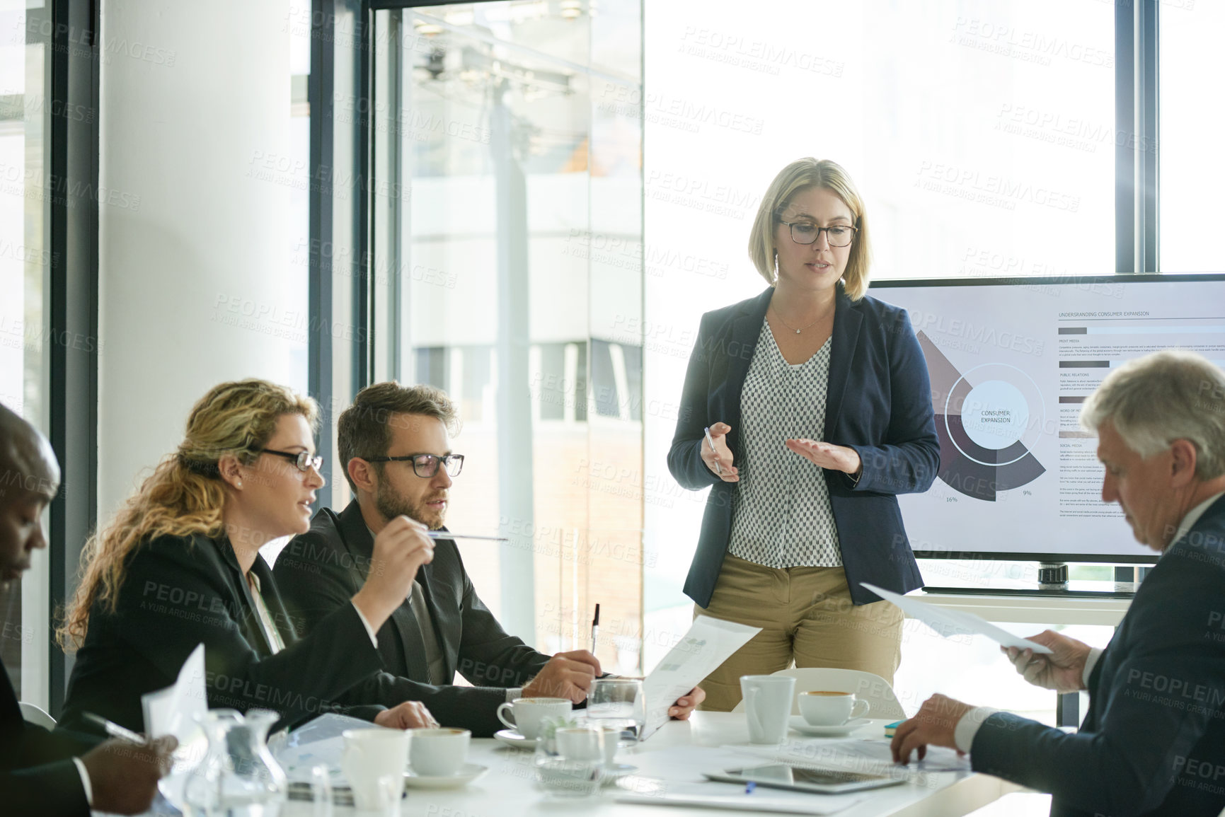 Buy stock photo Business people, meeting and presentation with documents for planning, brainstorming or proposal. Graphs, team and office communication with paperwork for project negotiation or collaboration