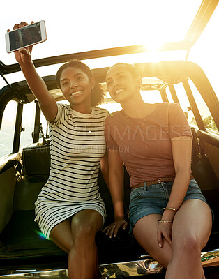 Buy stock photo Happy women, friends and car with selfie for photography, picture or road trip memory together. Female people, smile and capture moment with vehicle for outdoor travel, social media post or journey