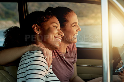 Buy stock photo Lesbian, couple and happy with travel in car with hug, road trip pause, and sightseeing ocean. Love, lgbt women and laugh with embrace in vehicle for journey break, holiday adventure or romantic date