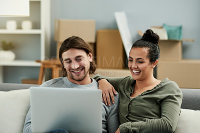 Buy stock photo Laptop, relax and subscription with couple on sofa in living room of new home together for entertainment. Computer, streaming service and watching video with happy people in apartment for moving day