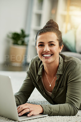 Buy stock photo Laptop, portrait and typing with woman on floor in living room of home for education or study. Computer, learning and smile with happy student on carpet in apartment for development, future or growth