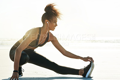 Buy stock photo Earphones, woman and leg stretching on beach to start fitness, muscle flexibility and cardio album. Mockup space, athlete and warm up on seashore for exercise preparation, getting ready and podcast