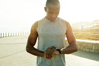 Buy stock photo Black man, smart watch or timer for run outdoor, ready or start training with cardio, health and fitness at beach. Runner, stopwatch or prepare for exercise, sports and wellness goal on the promenade