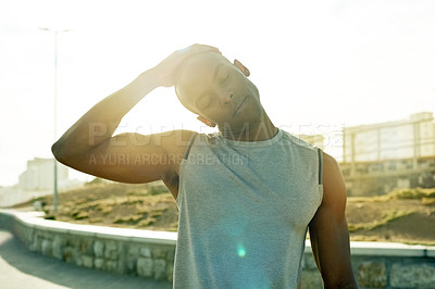 Buy stock photo Black man, stretching neck and fitness outdoor to start exercise, training and getting ready. Male person, runner and athlete warm up for sports workout, prepare muscles and marathon practice in city