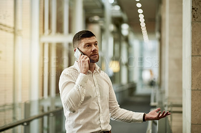 Buy stock photo Businessman, discussion and chat with phone call in hallway for negotiation or corporate deal. Man, salesperson or conversation with mobile smartphone for business proposal or explanation in corridor
