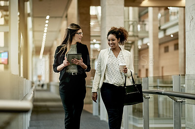 Buy stock photo Talk, happy team or business women walking in office with tablet for architecture or progress update. Discussion, meeting and architect in hallway for planning project, building development or bokeh