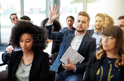 Buy stock photo Business, audience or man with hands raised in conference for question, answer or workshop feedback. Global summit, group or person with FAQ at event for career development, knowledge and engagement