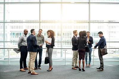Buy stock photo Conference, corporate and business people in lobby for talking, discussion and networking at event. Professional, convention and men with woman in conversation for meeting, collaboration and seminar