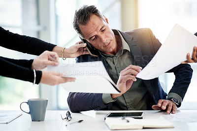 Buy stock photo Multitasking, busy or businessman in office with documents, administration crisis and pressure. Overwhelmed, toxic workflow or hands of people giving paperwork for deadline or phone call to manager