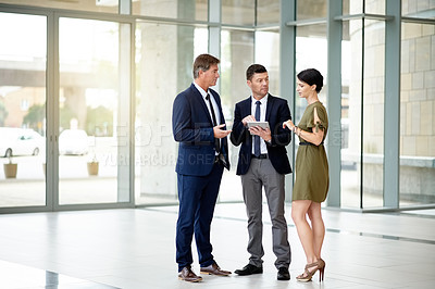 Buy stock photo Communication, office and employees with tablet for proposal, sales negotiation plan or business strategy. Digital presentation, discussion or people with tech to review, collaboration or cooperation