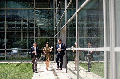 Buy stock photo Walking, coffee and talk with business people in city for labor advocate, legal team and morning commute. Travel, attorney partnership and drink with employees outdoor for court case discussion