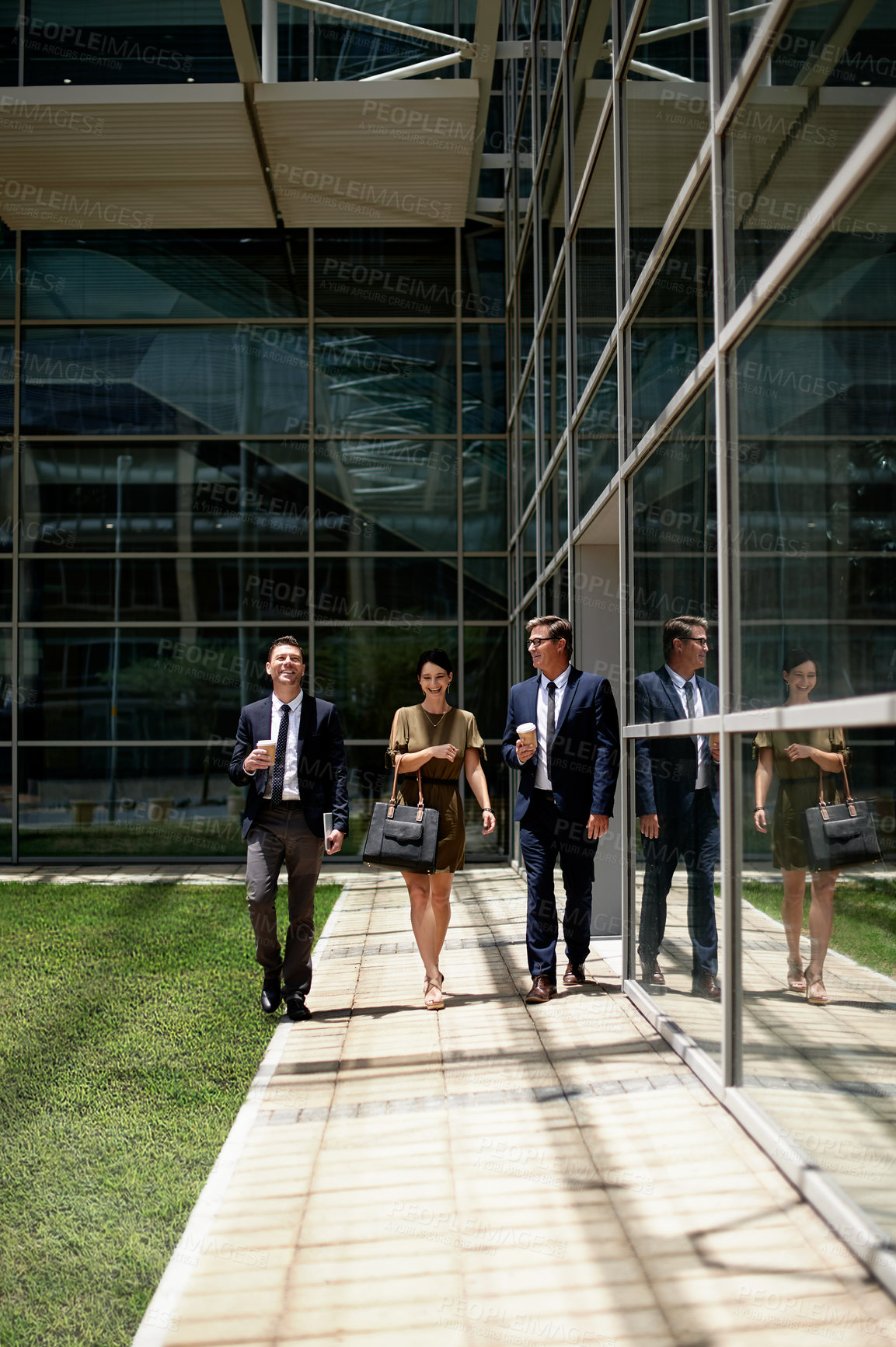 Buy stock photo Outdoor, business and people with smile by glass office, conversation and commute for work day. Happy, colleagues or travel to workplace with discussion, friendship and commitment in corporate career