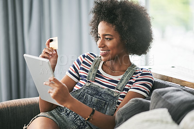 Buy stock photo Online shopping, card and woman with tablet, home or happy for digital purchase, payment and lounge. Rest, customer and African person with credit for discount, smile and tech for ecommerce in house