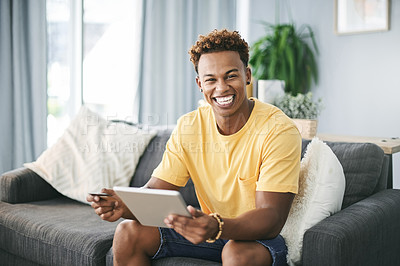 Buy stock photo Man, student in portrait and tablet in living room for scroll, internet search or ebook app for remote learning. Black person, tech for elearning application or university network to connect in home