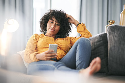 Buy stock photo Home, typing and woman on sofa, smartphone and message to contact, internet and relax. Apartment, cellphone and person on couch, social media and communication with connection and online reading