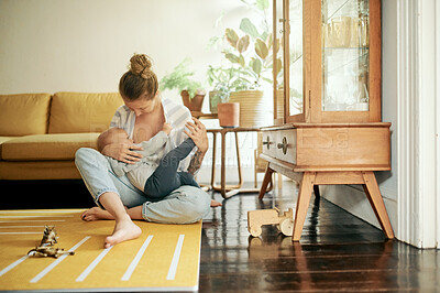 Buy stock photo Family, breastfeeding and mother and baby in home for bonding, quality time and relax together. Feeding, drinking natural milk and mom with child in living room for embrace, care and growth nutrition