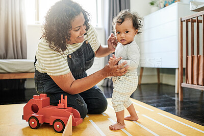 Buy stock photo Relax, family and mother play with baby in living room with building blocks, toys and playing games. Home, child development and happy mom and kid for bonding, quality time and together on floor