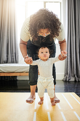 Buy stock photo Mother, baby and learning to walk holding hands in home, education and bonding in nursery. Care, development and mama teaching kid, toddler or newborn, helping and walking, support and first steps.