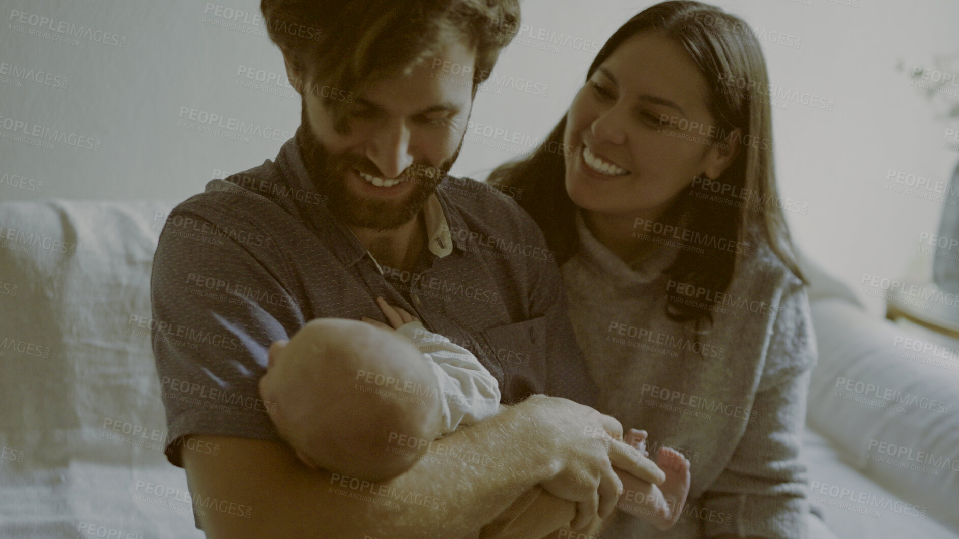 Buy stock photo Sofa, mom or dad with a newborn in a happy family to bond together for child development in home. Living room, smile or proud father with an excited mother or baby infant for love, safety or trust