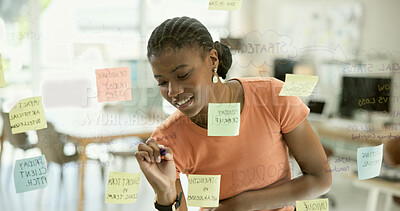 Buy stock photo Woman, writing and sticky notes on glass, planning and logistics or strategy for company. Black person, entrepreneur and brainstorming for startup, project and mind map for idea or research for tasks