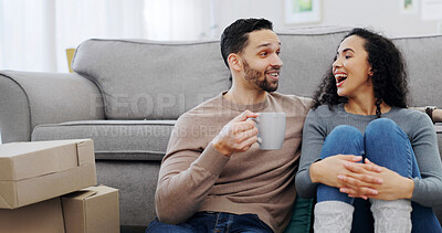 Buy stock photo Laughing, sofa and happy couple in house with boxes for funny joke, humor or moving in together. Man, woman and chilling with drink or coffee for relationship, comedy or relocation in new home