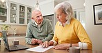 Paperwork, review and old couple in home with discussion, laptop and check invoice for utility bills. Married, elderly people and reading document with conversation for expenses, budget and planning.