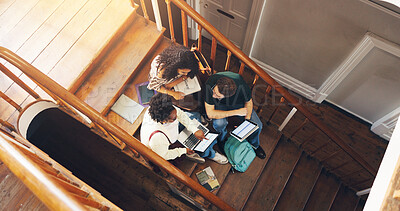 Buy stock photo Students, laptop and project in college with collaboration, learning and discussion for stats course. Above, people and study group on stairs with tech, data analytics and university for education.