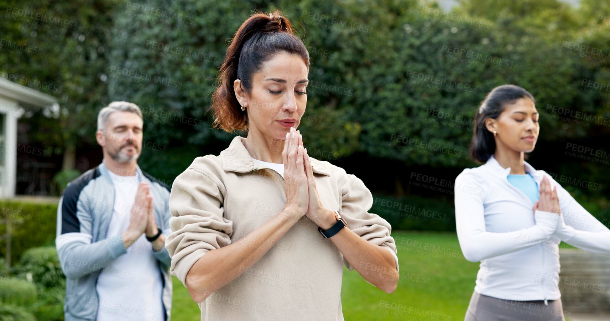 Buy stock photo Woman, meditation and yoga class outdoor with prayer hands, breathing exercise or peace for wellness. Zen, yogi and people in backyard with mudra, namaste pose and mindfulness for holistic health.