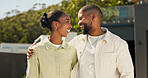 Happy, couple and support in front yard for real estate investment, mortgage purchase or home security. Property, black people and smile with hug for new house, relocation and marriage growth outdoor