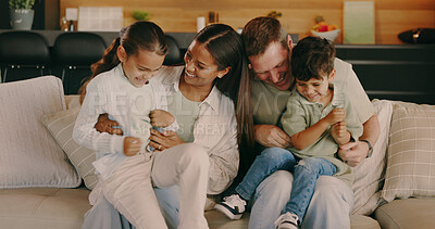 Buy stock photo Tickle, laugh and parents with kids on sofa for bonding, playful relationship and connection. Happy, family and children with mom, dad and playing for love, funny moment and relax in home on weekend