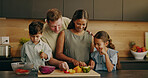Parents, cooking and laugh with children, home and helping mom with vegetables and talk in kitchen. Learning, recipe and happy people with kids, love and meal prep with family or connection in house