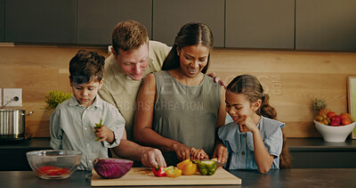 Buy stock photo Parents, cooking and laugh with children, home and helping mom with vegetables and talk in kitchen. Learning, recipe and happy people with kids, love and meal prep with family or connection in house