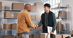 Boxes, logistics and businessmen with handshake in storage for small business deal or shipment. Male people, employees or shaking hands with agreement for distribution shop or supply chain contract
